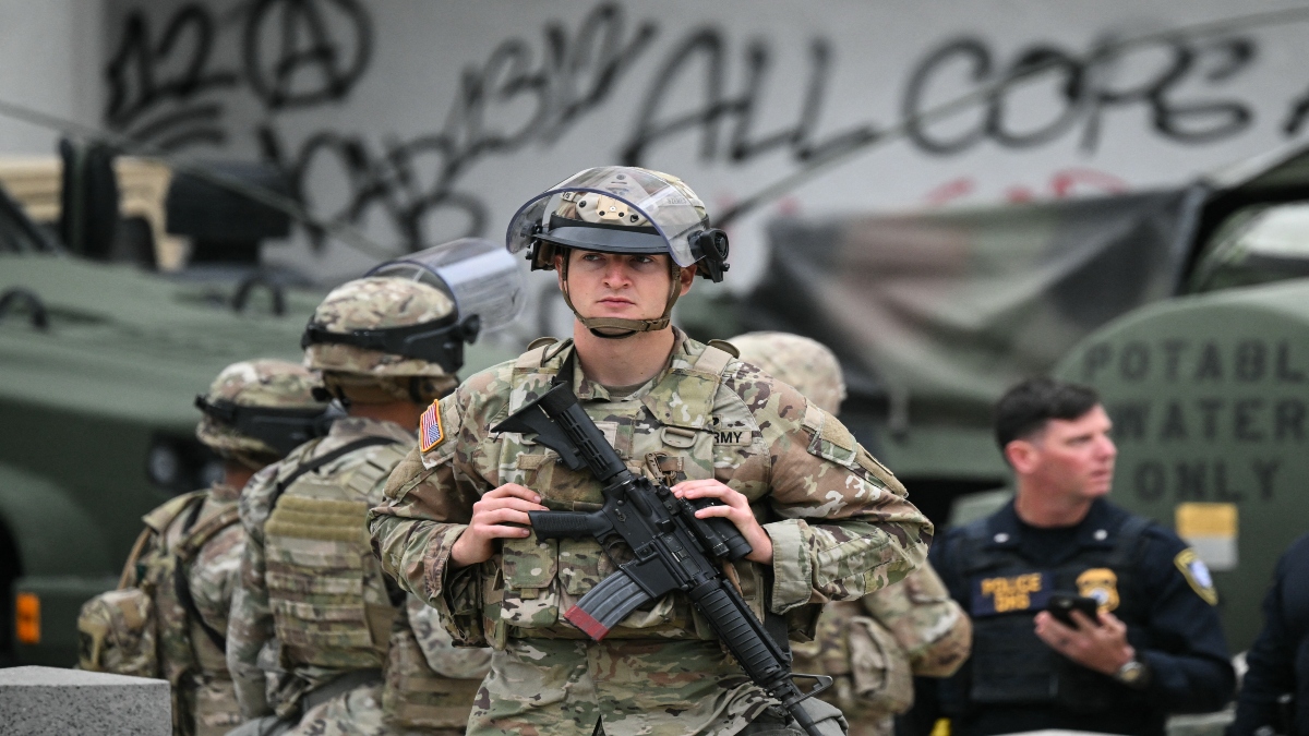 Members of the California National Guard stand watch outside the Edward R. Roybal Federal Building on Tuesday, following another day of protests in response to federal immigration operations in Los Angeles. AFP Members of the California National Guard stand watch outside the Edward R. Roybal Federal Building on Tuesday, following another day of protests in response to federal immigration operations in Los Angeles. AFP