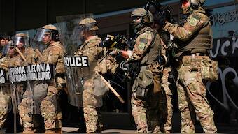 California National Guard troops stand guard as people attend a rally against federal immigration sweeps, in Los Angeles, California, US on June 9, 2025. Reuters