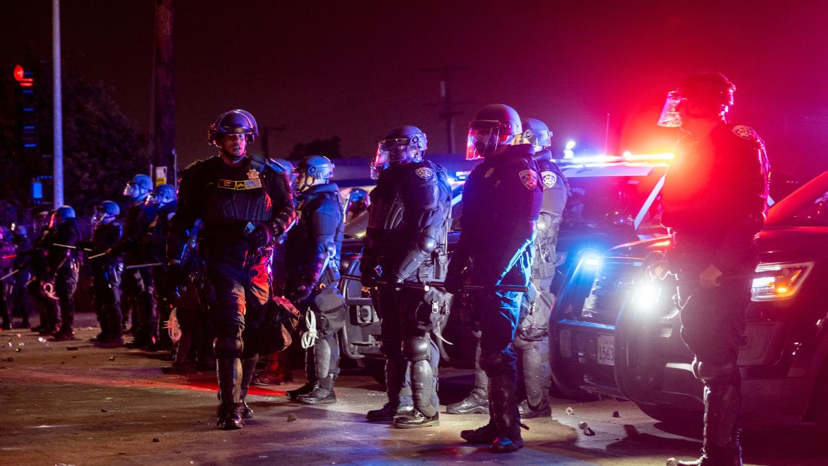 Law enforcement officers stand guard as they face off with demonstrators during a protest following federal immigration operations, in the Compton neighborhood of Los Angeles, California early on June 8, 2025. Image- AFP Law enforcement officers stand guard as they face off with demonstrators during a protest following federal immigration operations, in the Compton neighborhood of Los Angeles, California early on June 8, 2025. Image- AFP