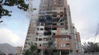 Damages are seen in a building after an explosion in a residence compound after Israel attacked Iran's capital Tehran, Friday, June 13, 2025. AP