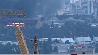 This frame grab from a video released by Iran state TV shows the the network building on fire after an Israeli drone attack, June 16, 2025, in Tehran, Iran. AP