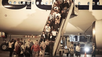The first group of Bulgarian citizens evacuated from Israel, along with dozens of foreign nationals from Slovenia, the U.S., Belgium, Albania, Kosovo and Romania, arrive at Vassil Levsky airport in Sofia, June 18, 2025. AP