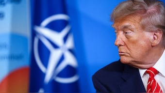 US President Donald Trump looks on next to NATO Secretary General Mark Rutte (not pictured) at the NATO summit of heads of state and government in The Hague on June 25, 2025. AFP 