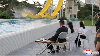 North Korean leader Kim Jong Un and his daughter Kim Ju Ae watch a person sliding down a slide during a ceremony to celebrate the completion of the Wonsan Kalma Coastal Tourist Zone, in Wonsan, North Korea, June 24, 2025.