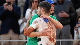 Carlos Alcaraz hugs Jannik Sinner after the French Open final. Image: Reuters