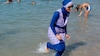 The politics of burkinis: Mandatory for women in Syria, banned in several European countries