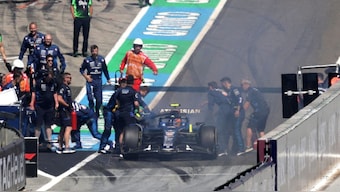Carlos Sainz is stuck at the end of the pit after his car broke down. Image: Reuters