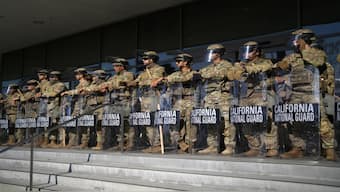 California National Guard stand in formation guarding the federal building in downtown Los Angeles on Tuesday, June 10, 2025. AP