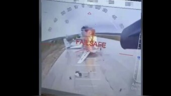 A Ukrainian drone striking Russian planes deep in Russia's territory. AP