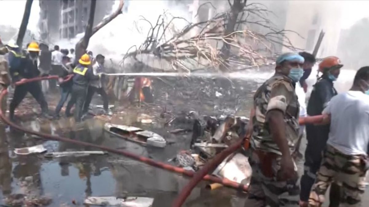 Emergency personnel work at the crash site of an Air India plane in Ahmedabad, India, June 12, 2025, in this still image taken from video. Source: ANI Emergency personnel work at the crash site of an Air India plane in Ahmedabad, India, June 12, 2025, in this still image taken from video. Source: ANI