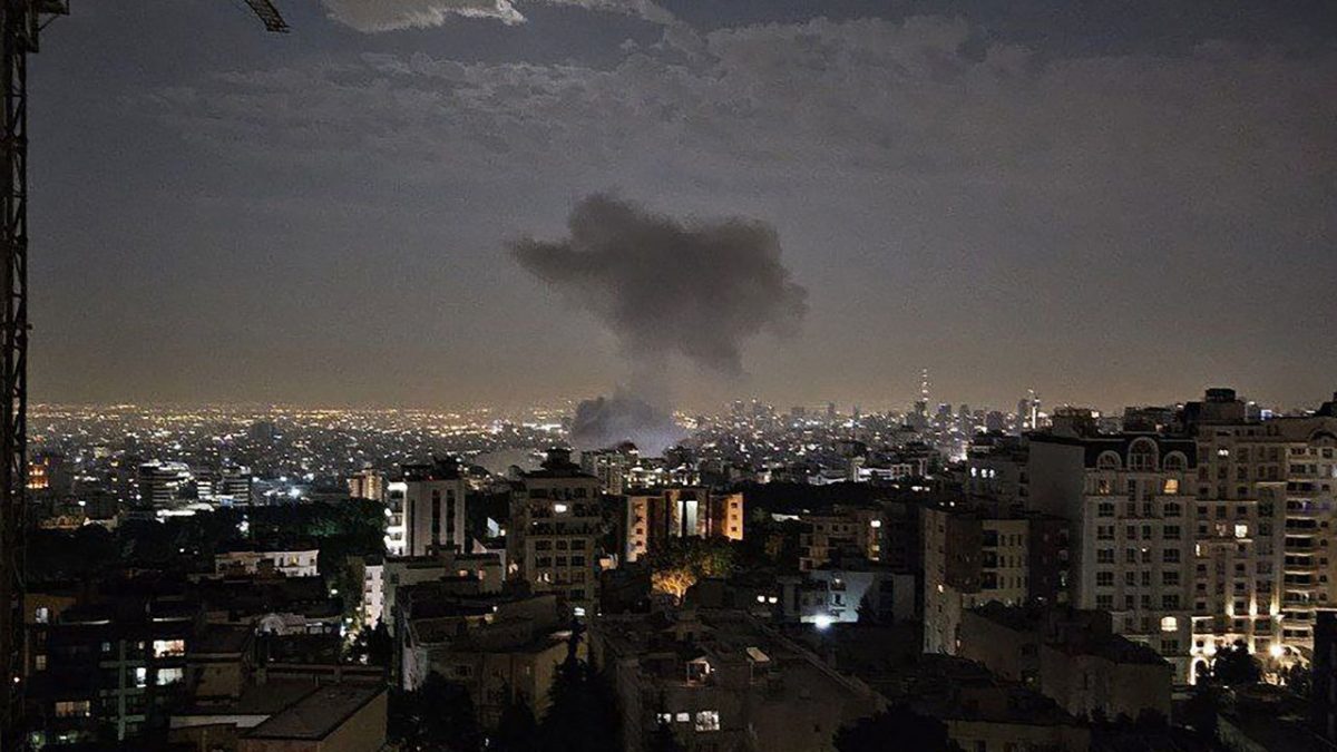This handout photo released by Iran's Revolutionary Guard Corps' (IRGC) official Sepah News Telegram channel on June 13, 2025 shows smoke billowing from a site reportedly targeted by an Israeli strike in the Iranian capital Tehran early in the morning. This handout photo released by Iran's Revolutionary Guard Corps' (IRGC) official Sepah News Telegram channel on June 13, 2025 shows smoke billowing from a site reportedly targeted by an Israeli strike in the Iranian capital Tehran early in the morning.