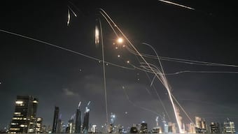 Israel's air defenses fended off many of the more than 100 missiles launched. Source: AP