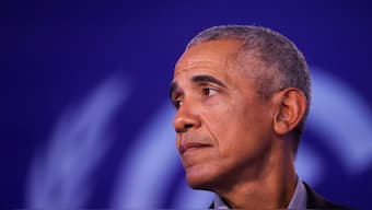 U.S. former President Barack Obama looks on during the UN Climate Change Conference (COP26), in Glasgow, Scotland, Britain, November 8, 2021. Source: Reuters