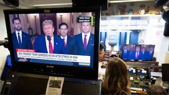 US President Donald Trump addresses the nation regarding the US bombing of Iranian nuclear sites as seen on a television screen in the Brady Press Briefing Room at the White House in Washington, DC. Source: AFP