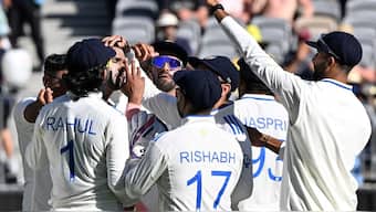 Indian players celebrate after taking a wicket in a match. Image: AFP