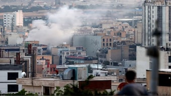 Smoke billows from an explosion in southwest Tehran. Iran's state broadcaster was briefly knocked off the air by an Israeli strike and explosions rang out across Tehran on the fifth day of an escalating air war. AFP