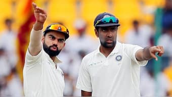 Virat Kohli and Ashwin setting the field during a Test match. Image: Reuters