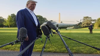 US President Donald Trump speaks with reporters before boarding Marine One on the South Lawn of the White House. It is during this interaction that he dropped the F-bomb. AP