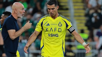 Cristiano Ronaldo and Stefano Pioli during a match. Image: Reuters