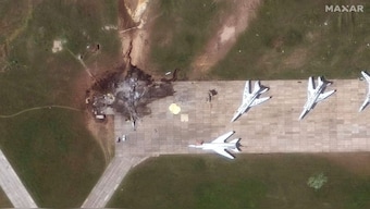 A satellite image shows a destroyed TU 22 aircraft in the aftermath of June 1 drone strike at the Belaya air base, Irkutsk region in Russia, June 4. Maxar Technologies/Handout via Reuters

