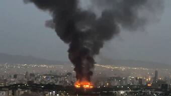 Smoke rises from a fire, as the Israel-Iran air war continues, in Tehran, Iran. Reuters
