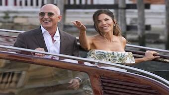 Jeff Bezos and Lauren Sanchez leave a hotel for their pre-wedding reception, in Venice, Italy. The three-day extravaganza comes with a price tag of “at least €40 million,” or around $46 million (Rs 400 crore). AP