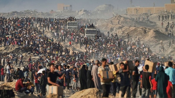 120 dead as truckloads of aid wait to enter starvation-hit Gaza. What’s holding them back?