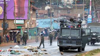Riot police officers clear a blocked road during anti-government protests dubbed "Saba Saba People's March", in Kangemi area of Nairobi, Kenya. Reuters