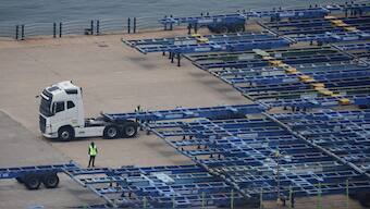 Employees work at Pyeongtaek port in Pyeongtaek, South Korea. Reuters