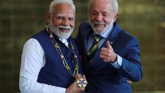 Brazil's President Luiz Inacio Lula da Silva gives a thumbs up, after he presented India's Prime Minister Narendra Modi with the National Order of the Southern Cross - a prestigious honor awarded by the Brazilian president to foreign dignitaries, during a ceremony at the Alvorada Palace in Brasília, Brazil. Reuters