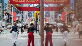A person enters a Wells Fargo branch in New York City, US, July 18, 2025. Reuters