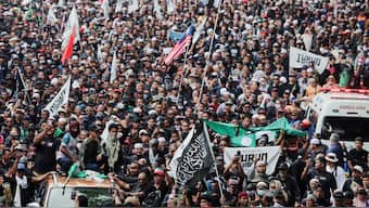 People march during a protest calling for Malaysian Prime Minister Anwar Ibrahim to resign in Kuala Lumpur, Malaysia. Reuters