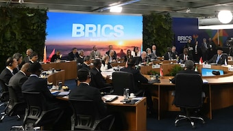 Brazil's President Luiz Inacio Lula da Silva (C) speaks during the first plenary session of the BRICS summit in Rio de Janeiro, Brazil. AFP