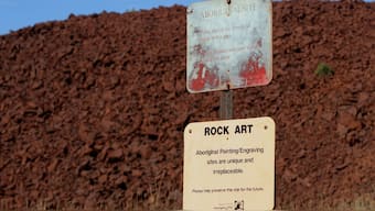 Aboriginal site preservation signs stand near the entrance to Deep Gorge on the Burrup Peninsula in the north of Western Australia, close to the site of some one million pieces of Aboriginal rock engravings several thousands of years old and considered by some to be the greatest concentration of such ancient art in the world. File image/ AFP