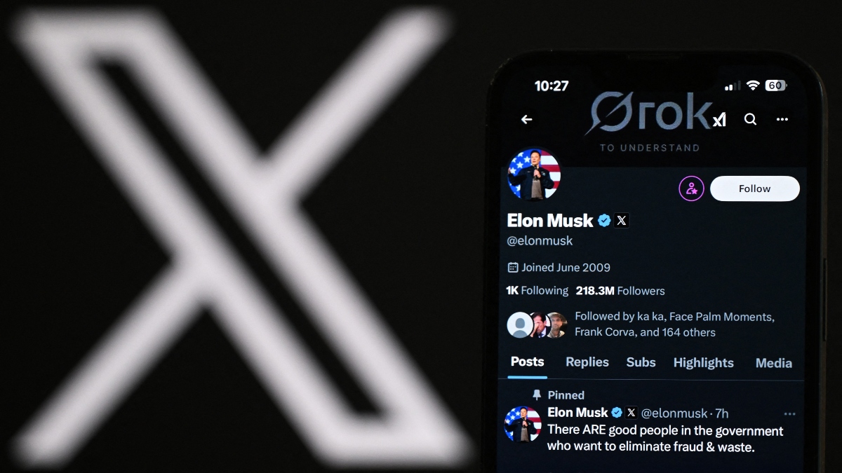 An illustration photograph taken on February 20, 2025 shows the X account of Elon Musk displayed on a phone screen next to the X logo displayed on a laptop screen, in a residential property in Guildford, south of London. AFP An illustration photograph taken on February 20, 2025 shows the X account of Elon Musk displayed on a phone screen next to the X logo displayed on a laptop screen, in a residential property in Guildford, south of London. AFP