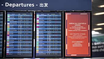 A departures information board is seen at Orly airport, near Paris, as French air traffic controllers launched a two-day strike to demand better working conditions. AP