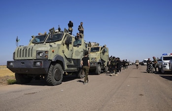 Syrian government security forces gather on the outskirts of Sweida province. FIle Image / AP