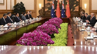 Australian Prime Minister Anthony Albanese, right, talks to China's President Xi Jinping, second left, in the Great Hall of the People in Beijing, China. AP