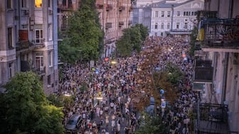 Thousands of people protest against a law targeting anti-corruption institutions near the President's Office in Kyiv, Ukraine. AP