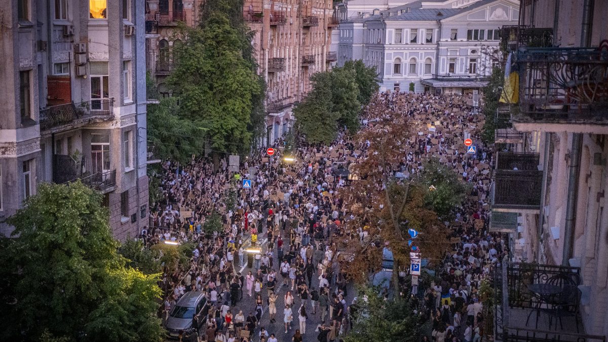 Thousands of people protest against a law targeting anti-corruption institutions near the President's Office in Kyiv, Ukraine. AP Thousands of people protest against a law targeting anti-corruption institutions near the President's Office in Kyiv, Ukraine. AP