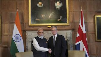 Britain's Prime Minister Keir Starmer welcomes Indian Prime Minister Narendra Modi at Chequers near Aylesbury, England. AP