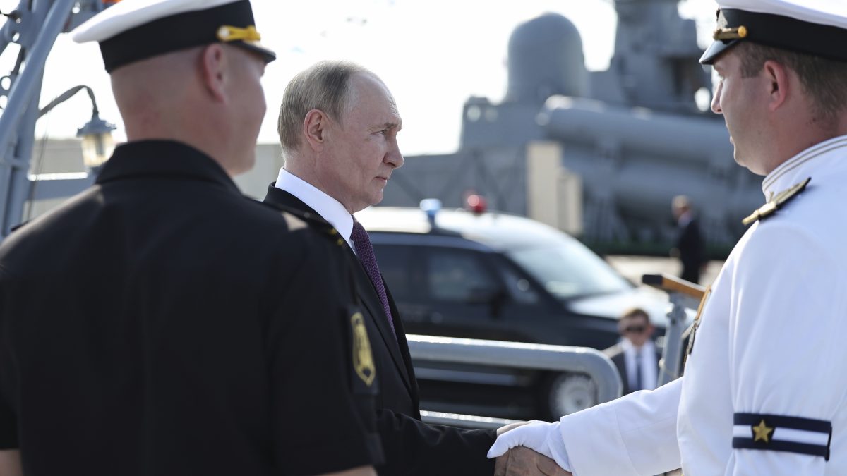 Russian President Vladimir Putin, second left arrives to visit the frigate "Admiral Grigorovich" in Kronstadt, outside St. Petersburg during Navy Day celebration, Russia. AP Russian President Vladimir Putin, second left arrives to visit the frigate "Admiral Grigorovich" in Kronstadt, outside St. Petersburg during Navy Day celebration, Russia. AP