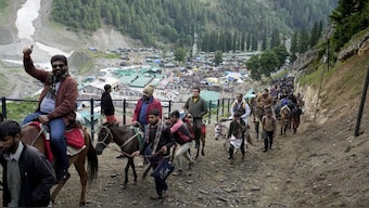 Pilgrims on their way to the holy cave shrine of Amarnath at Baltal in Ganderbal district of central Kashmir. File image/PTI