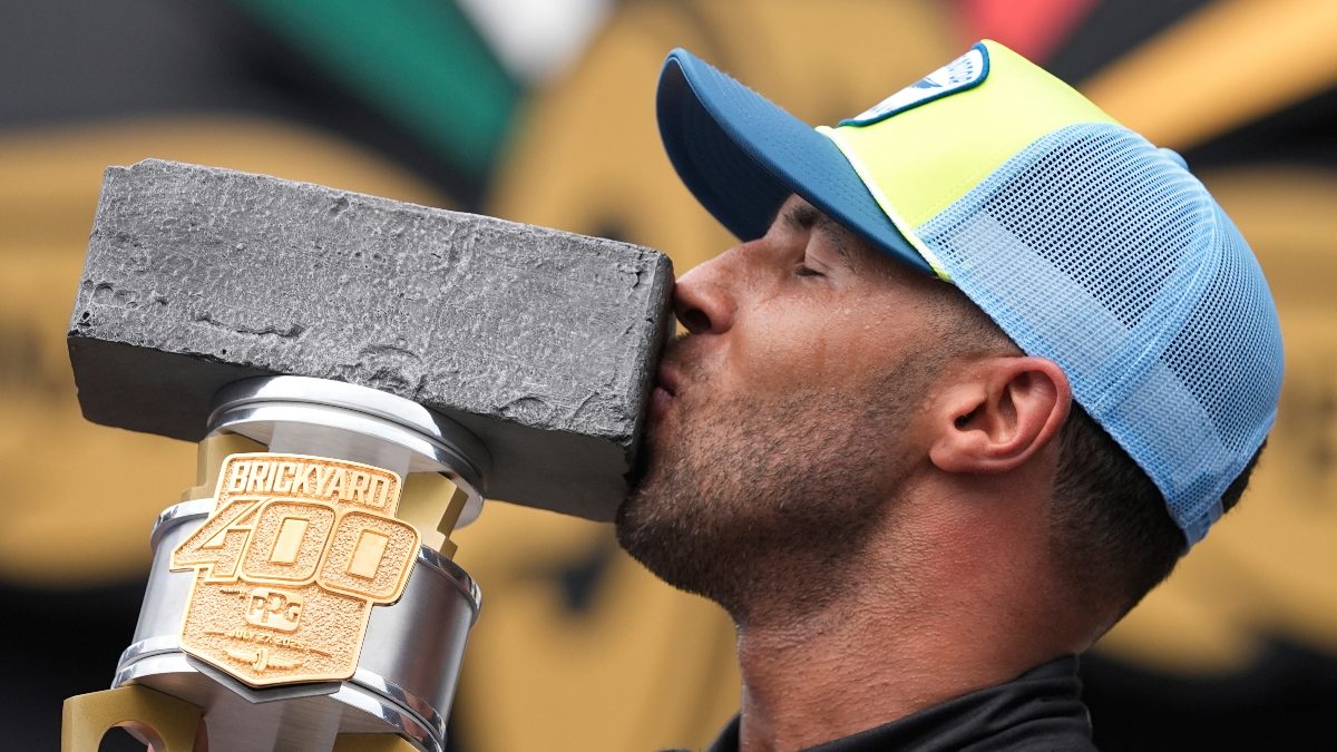 Bubba Wallace kisses the trophy after winning a NASCAR Cup Series auto race at Indianapolis Motor Speedway. Image: AP
Bubba Wallace kisses the trophy after winning a NASCAR Cup Series auto race at Indianapolis Motor Speedway. Image: AP