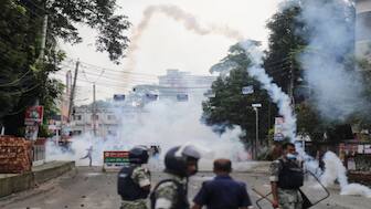 Security forces throw tear gas cans and sound grenades to disperse the Awami League supporters following a clash during the National Citizen Party rally, in Gopalganj, Bangladesh, July 16, 2025. Reuters