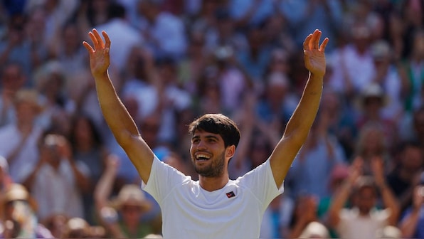 Alcaraz subdues big-serving Fritz and searing heat to reach third straight Wimbledon final