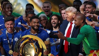 Donald Trump was on the stage as Chelsea players celebrated winning the Club World Cup final against PSG. Image: Reuters