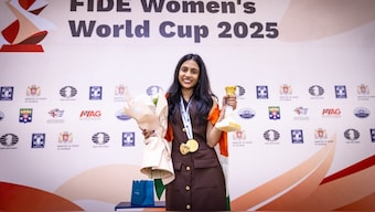 India's Divya Deshmukh poses with the Women’s Chess World Cup trophy. Image: FIDE
