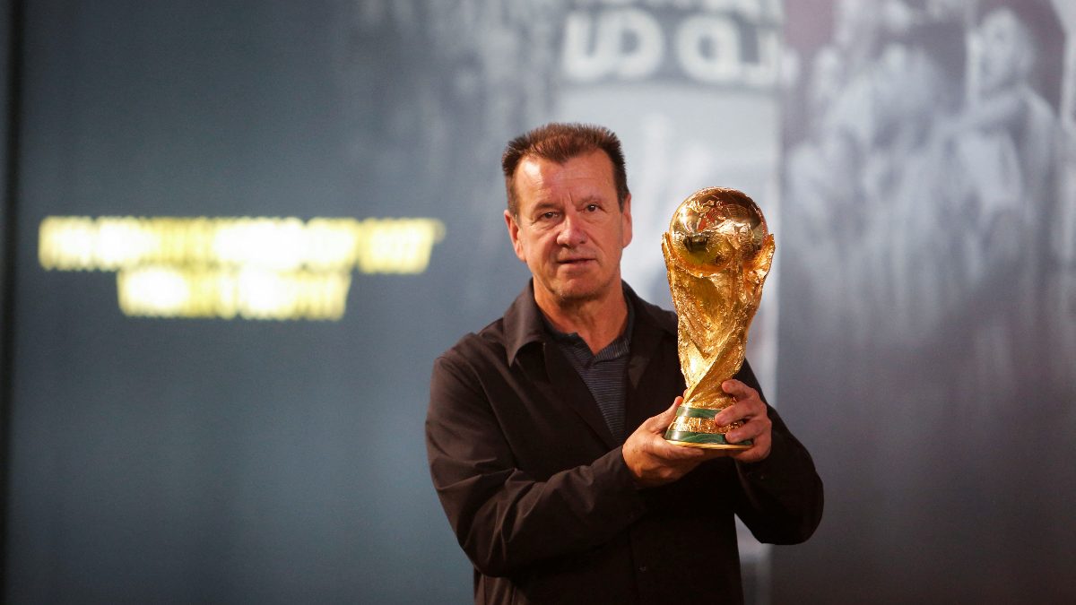 Brazil footballer and former coach Dunga with the FIFA World Cup trophy. Image: Reuters
Brazil footballer and former coach Dunga with the FIFA World Cup trophy. Image: Reuters