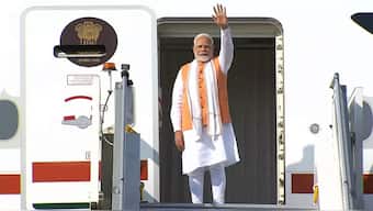 Prime Minister Narendra Modi waves as he emplanes for Accra, Ghana. PTI
